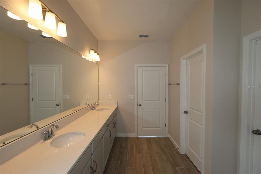 Furnished interior view inside a new home in Center Lake on the Park, St. Cloud (Image 4).
