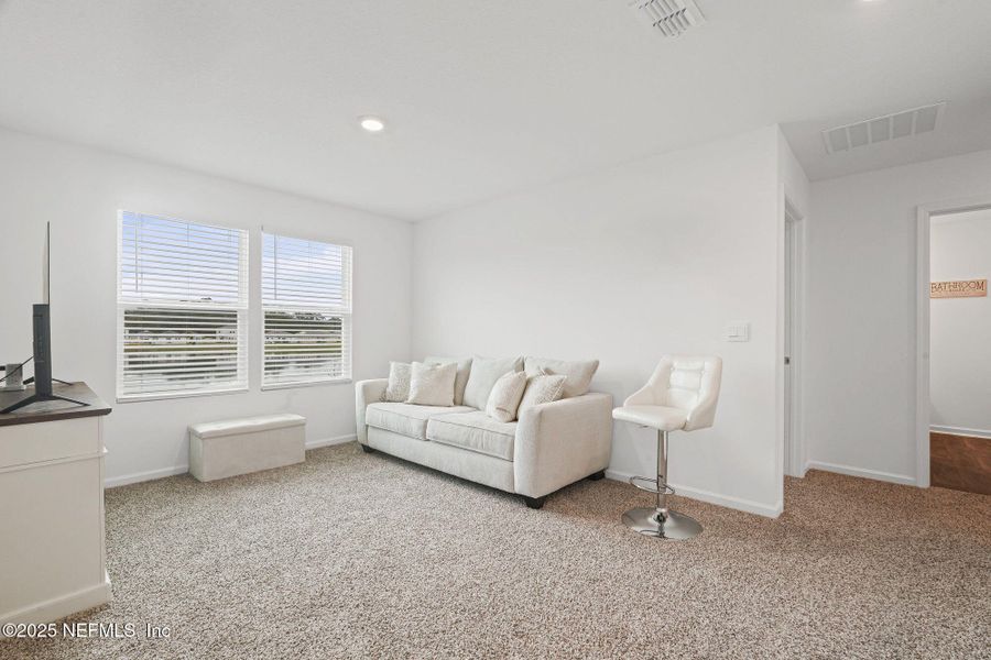 Furnished interior view inside a new home in Entrada, St. Augustine (Image 41).