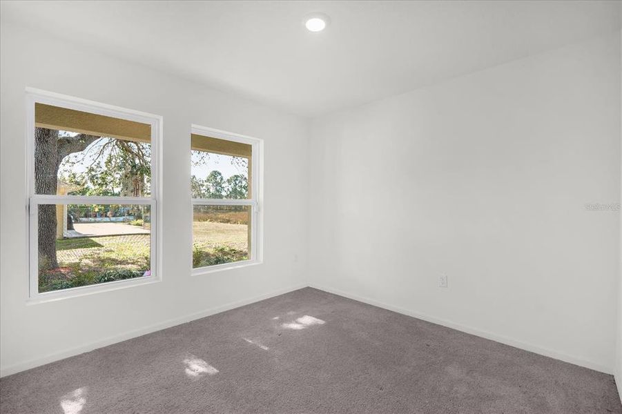 Spacious, unfurnished interior of a new home in Poinciana Village, Kissimmee (Image 20).