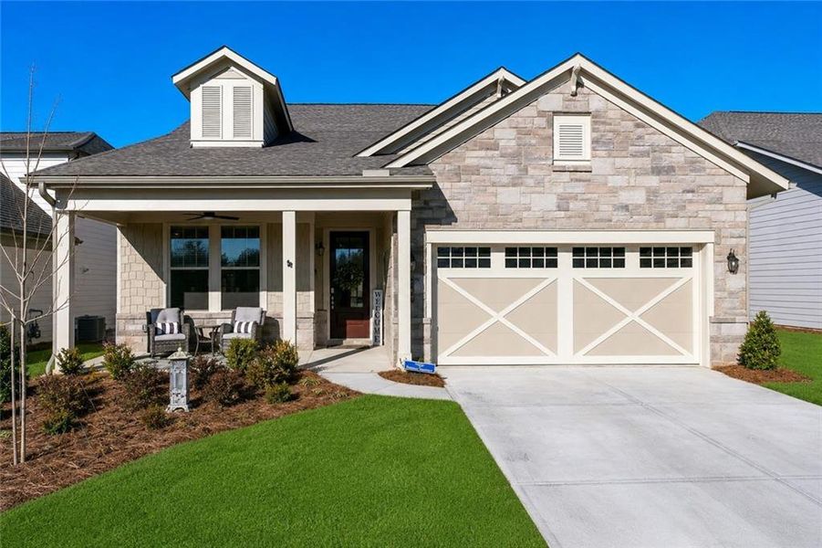 Front exterior of a new home in , Hoschton, GA, highlighting curb appeal (Image 24).