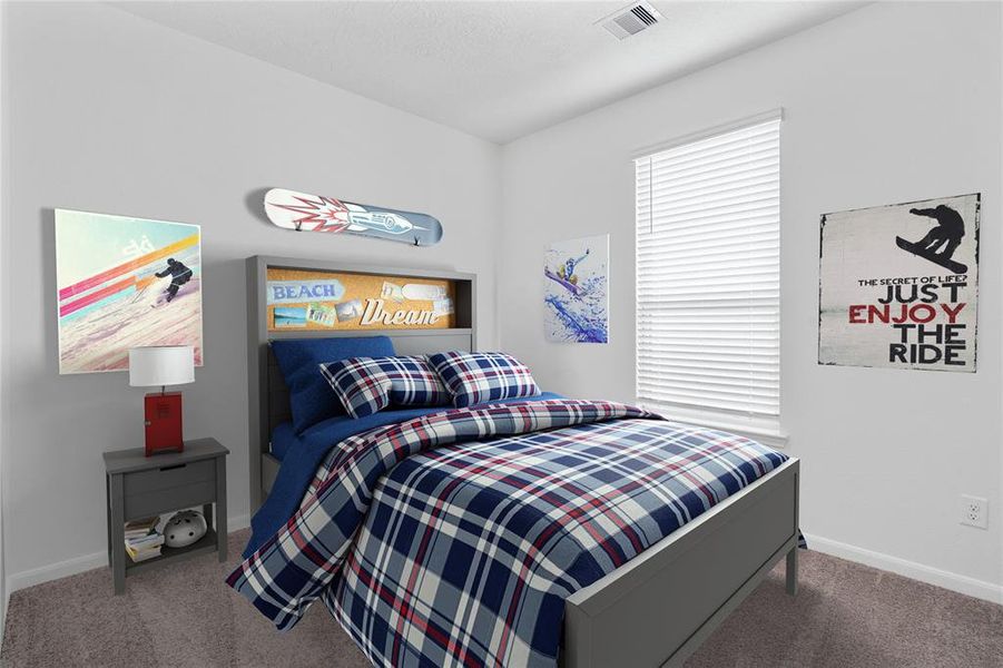 Secondary bedroom features plush carpet, neutral paint, lighting, large window with privacy blinds and ample sized closet space.