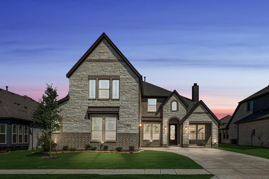 Front exterior of a new home in Bear Creek Classic 60, Lavon, TX, highlighting curb appeal (Image 2). Front exterior of a new home in Bear Creek Classic 60, Lavon, TX, highlighting curb appeal (Image 2).
