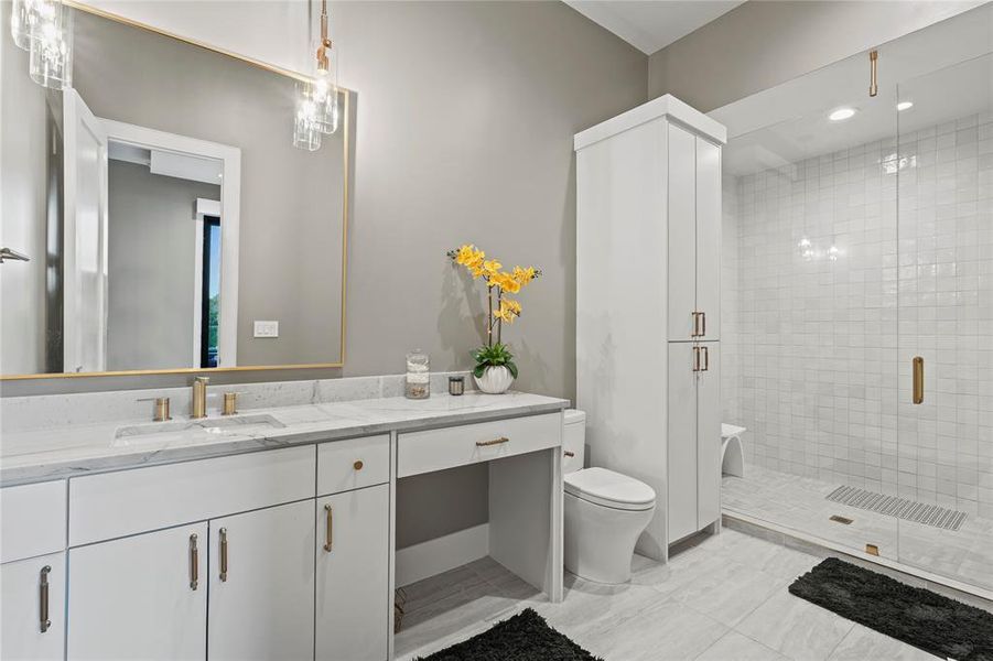 Bathroom featuring vanity, a shower stall, and recessed lighting Bathroom featuring vanity, a shower stall, and recessed lighting