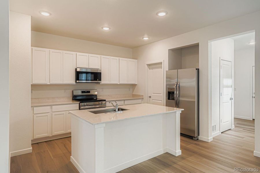 Furnished interior view inside a new home in , Thornton (Image 6).