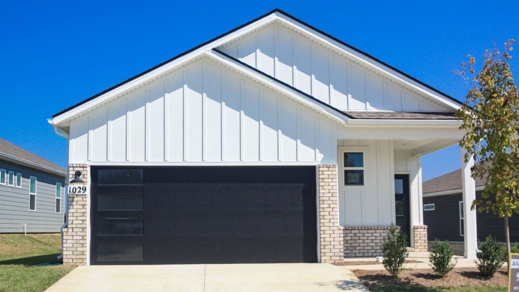 Front exterior of a new home in Nexus South, Gallatin, TN, highlighting curb appeal (Image 21). Front exterior of a new home in Nexus South, Gallatin, TN, highlighting curb appeal (Image 21).