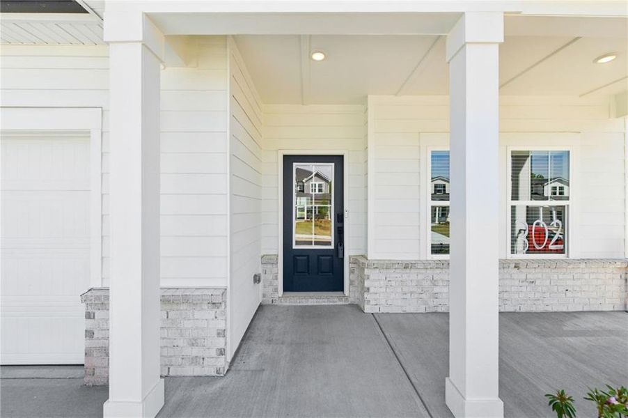 Exterior details and patio area of a home in Vines at Mill Creek - Estate Series, Braselton (Image 33).
