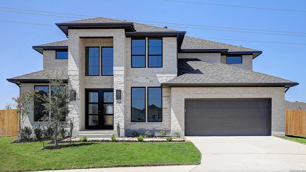 Front exterior of a new home in Haby Hill, San Antonio, TX, highlighting curb appeal (Image 1). Front exterior of a new home in Haby Hill, San Antonio, TX, highlighting curb appeal (Image 1).