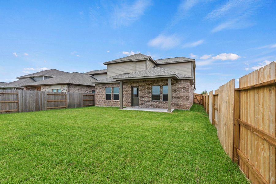 Exterior details and patio area of a home in Windrose Green, Angleton (Image 4). Exterior details and patio area of a home in Windrose Green, Angleton (Image 4).