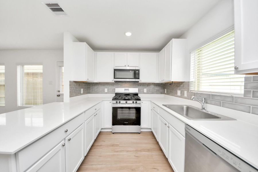 Functional layout with generous counter space.