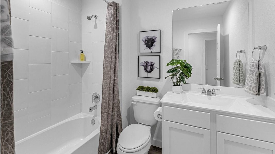Representative photo. The second floor is designed for comfort and flexibility, highlighted by a spacious primary suite with a well-appointed bath that includes a separate shower and tub. Two additional bedrooms easily accommodate guests, while a central flex space creates endless possibilities for a game room, second living area, or personalized retreat. Representative photo. The second floor is designed for comfort and flexibility, highlighted by a spacious primary suite with a well-appointed bath that includes a separate shower and tub. Two additional bedrooms easily accommodate guests, while a central flex space creates endless possibilities for a game room, second living area, or personalized retreat.