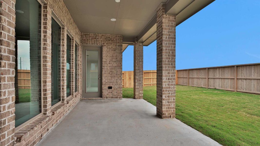 Exterior details and patio area of a home in Grange, Katy (Image 2). Exterior details and patio area of a home in Grange, Katy (Image 2).