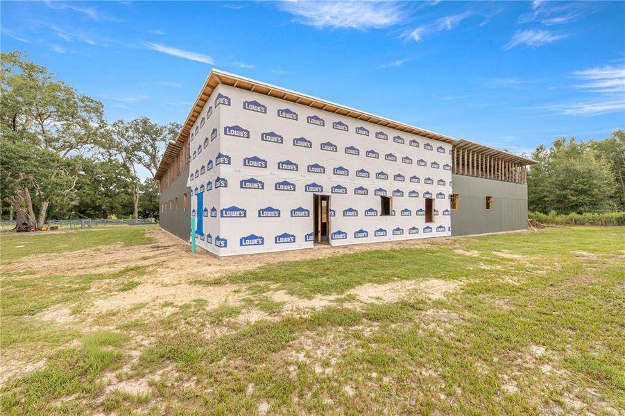 Front exterior of a new home in , Ocala, FL, highlighting curb appeal (Image 13). Front exterior of a new home in , Ocala, FL, highlighting curb appeal (Image 13).