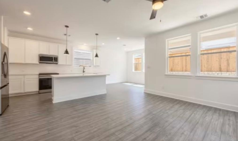 Spacious, unfurnished interior of a new home in Ryegrass Collection – Freedom at Anthem, Kyle (Image 8).