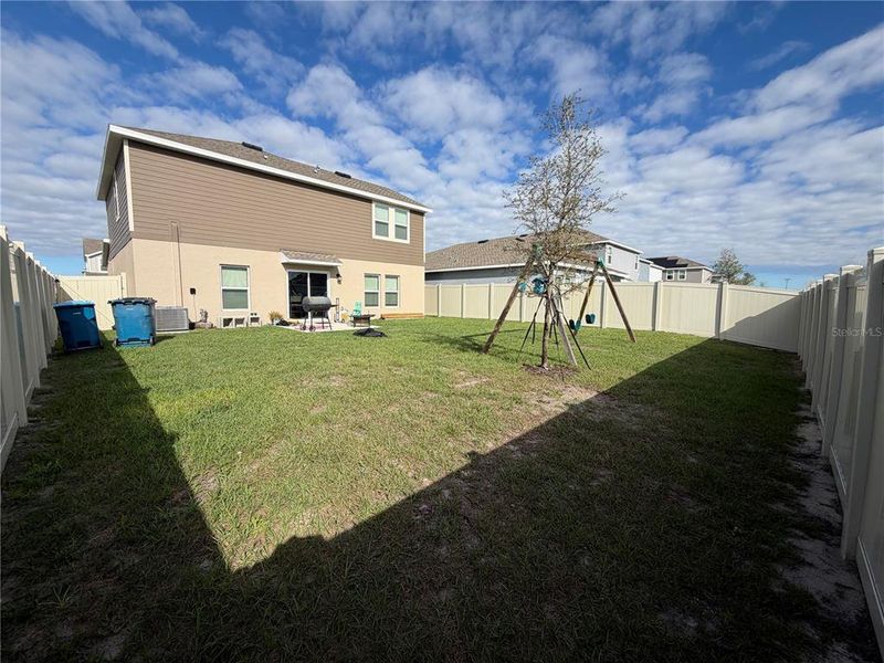 Exterior details and patio area of a home in Ranches at Lake McLeod, Eagle Lake (Image 3).