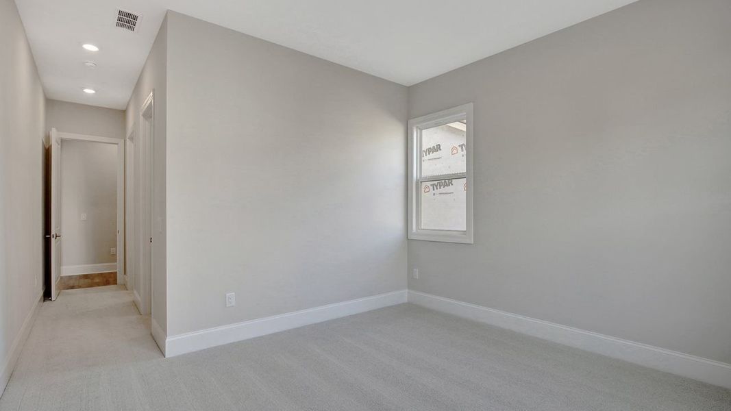 Taylor Model | Front bedroom not staged