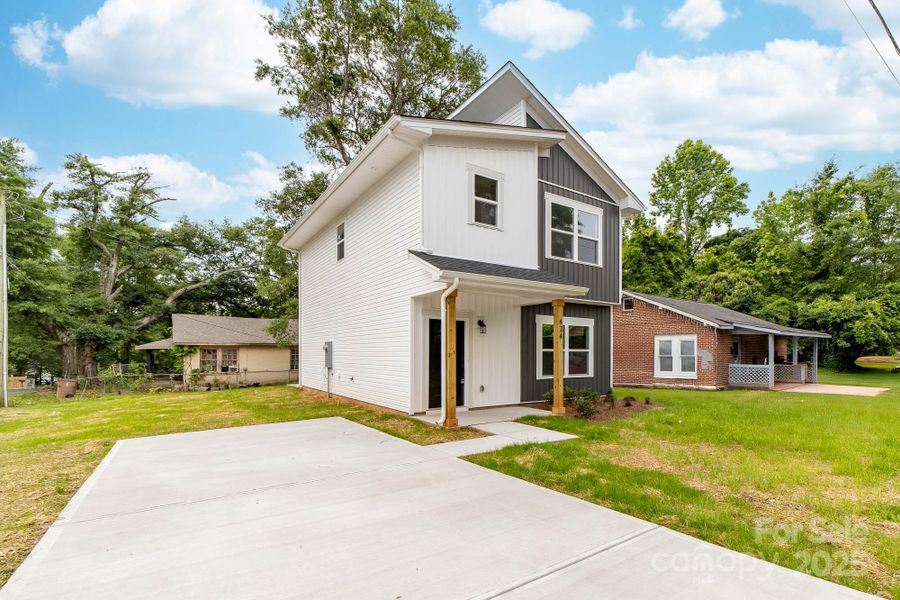 Front exterior of a new home in , Shelby, NC, highlighting curb appeal (Image 1). Front exterior of a new home in , Shelby, NC, highlighting curb appeal (Image 1).