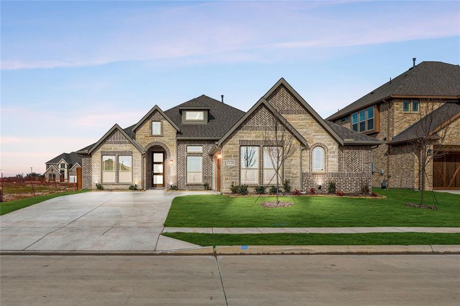 Front exterior of a new home in Stone River Glen 60s, Royse City, TX, highlighting curb appeal (Image 18).