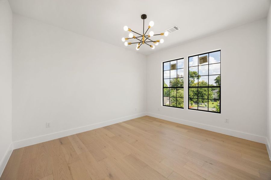 Third level bedroom with natural lighting.