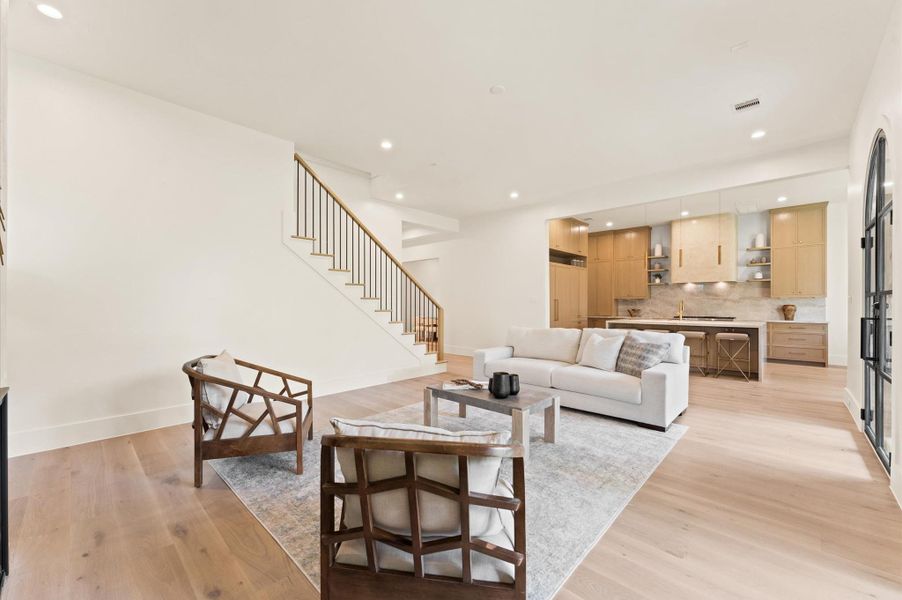 Another view of the expansive living area and kitchen. Another view of the expansive living area and kitchen.