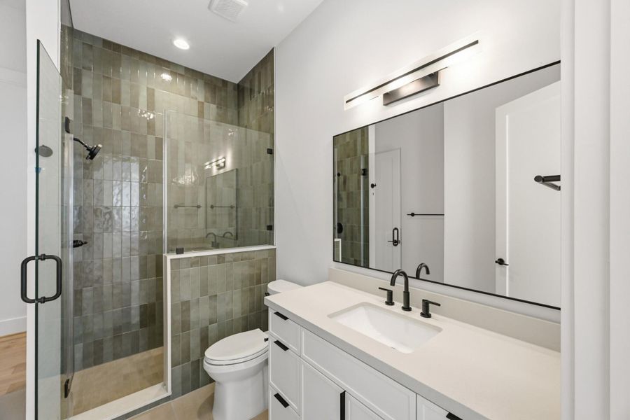 This central full bath serves both the bedroom and game room!