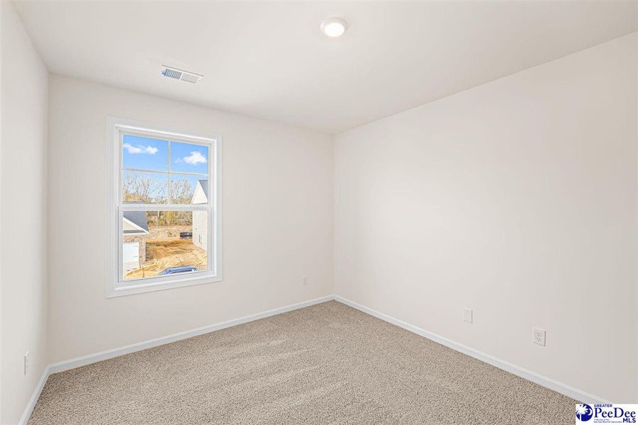 Spacious, unfurnished interior of a new home in The Grove, Florence (Image 21).