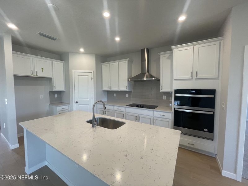 Furnished interior view inside a new home in Magnolia Series at Seminole Palms, Palm Coast (Image 5).