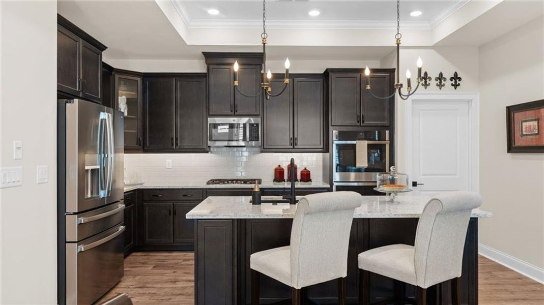 Furnished interior view inside a new home in The Courtyards at Bailey Farms, Dacula (Image 12).
