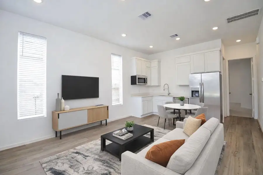 Enjoy the convenience of an attached guest suite with its own private entrance