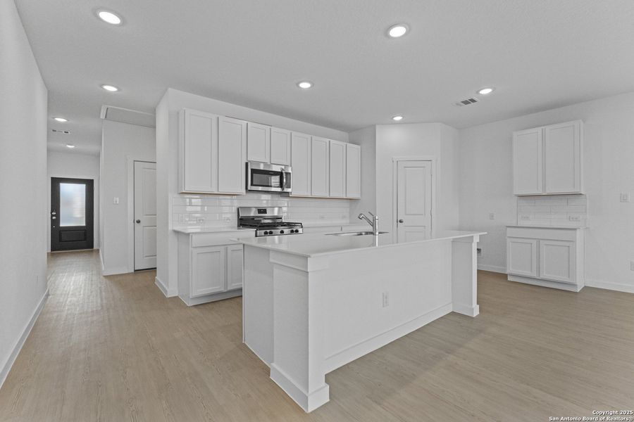 Furnished interior view inside a new home in Hidden Trails: Coastline Collection, Bulverde (Image 7).