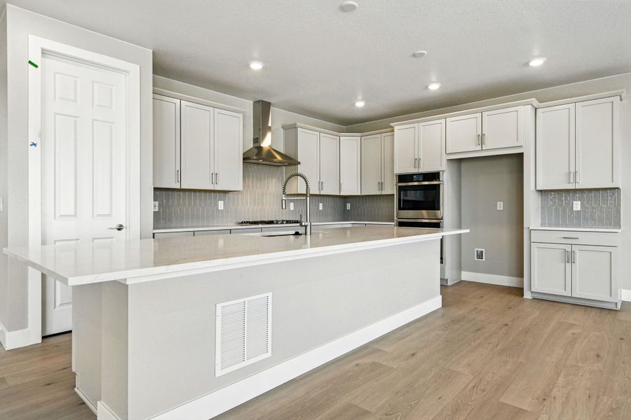 Furnished interior view inside a new home in Trailstone, Arvada (Image 13).