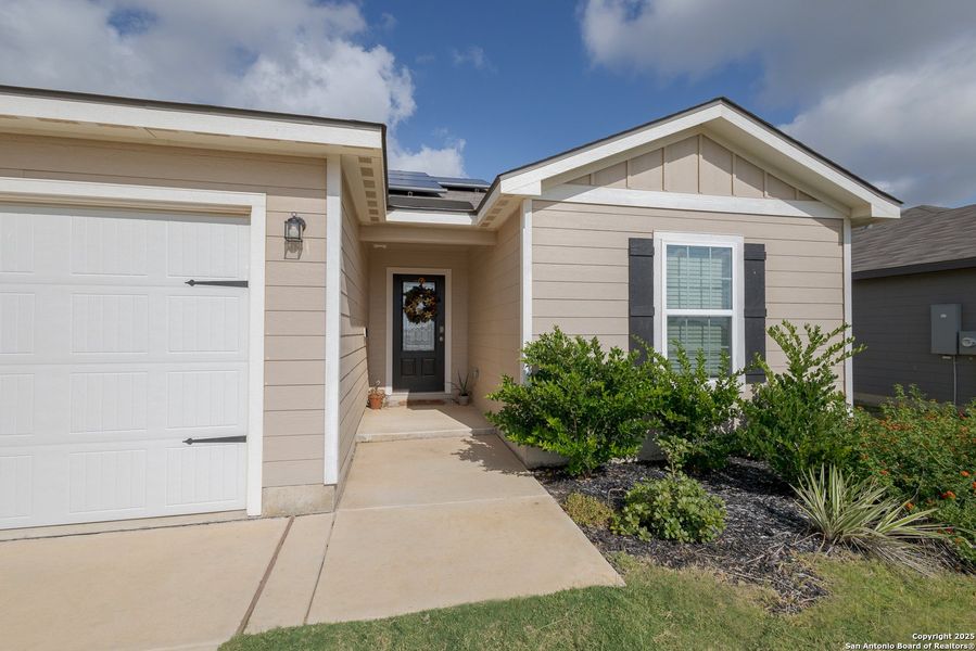 Front exterior of a new home in Rosewood Estates, Lytle, TX, highlighting curb appeal (Image 14).