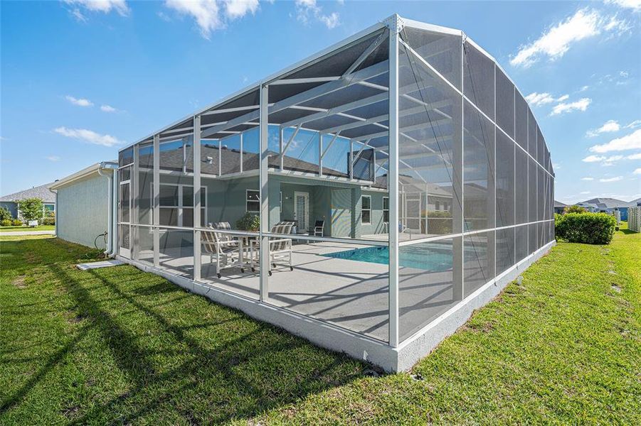 Exterior details and patio area of a home in , The Villages (Image 36).