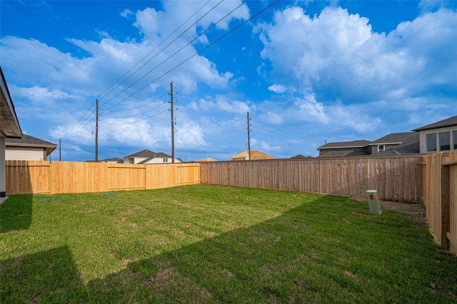 Exterior details and patio area of a home in Tamarron, Fulshear (Image 33). Exterior details and patio area of a home in Tamarron, Fulshear (Image 33).