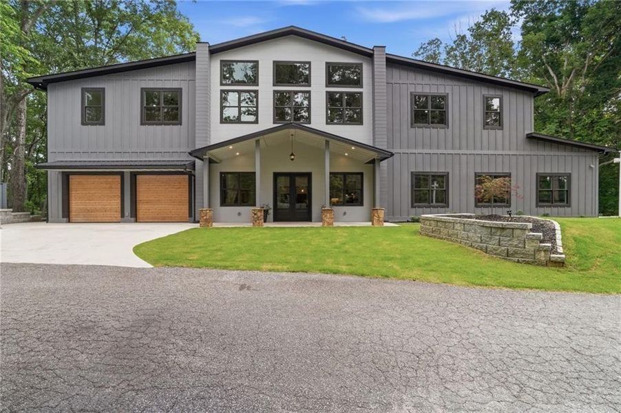 Front exterior of a new home in , Acworth, GA, highlighting curb appeal (Image 32).