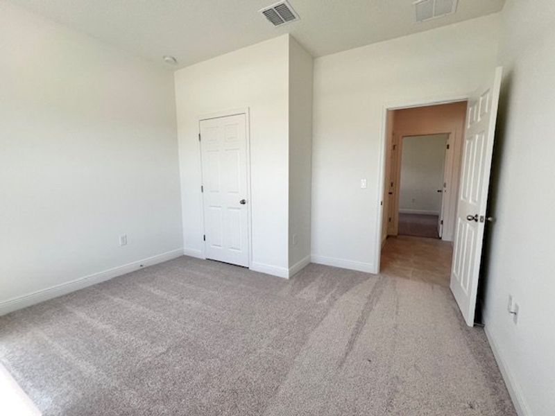 Spacious, unfurnished interior of a new home in Lakes At St Sebastian, Micco (Image 15).