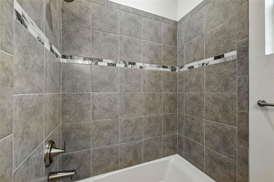 Bathroom with shower / tub combination