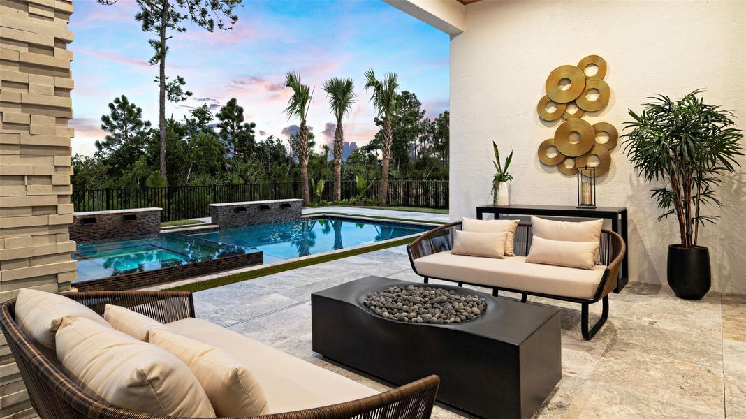 Exterior details and patio area of a home in L'Ambiance at Avenir, Palm Beach Gardens (Image 22).