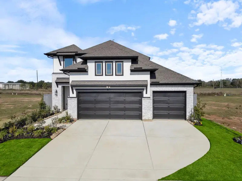 Front exterior of a new home in Jubilee, Hockley, TX, highlighting curb appeal (Image 1). Front exterior of a new home in Jubilee, Hockley, TX, highlighting curb appeal (Image 1).