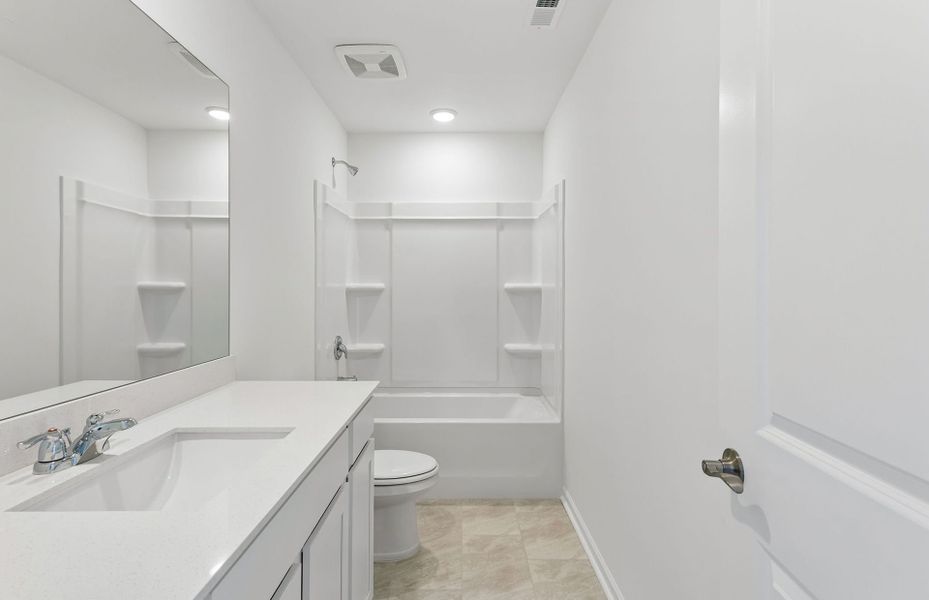 Furnished interior view inside a new home in Highlands of Carter's Station, Columbia (Image 10). Furnished interior view inside a new home in Highlands of Carter's Station, Columbia (Image 10).