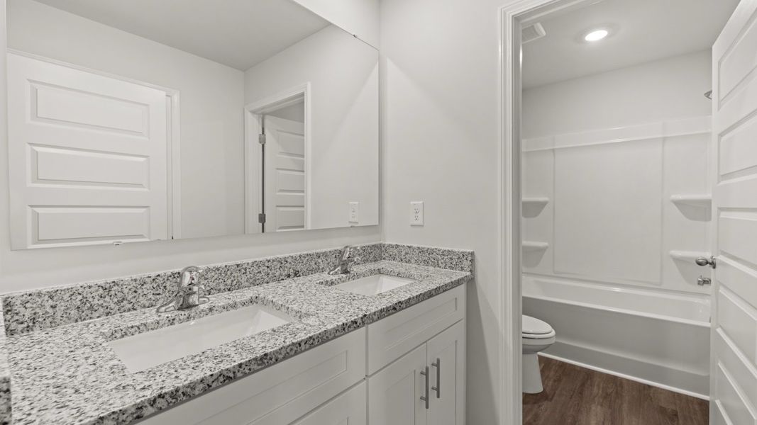 Representative furnished interior of a home built from the Halton by D.R. Horton in Southwind Village, Evans (Image 12).