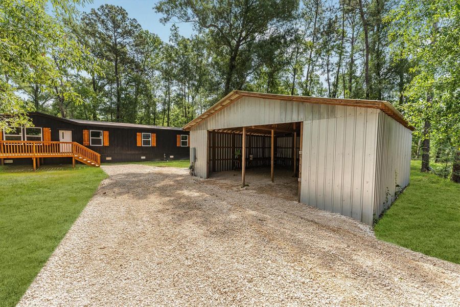 Exterior details and patio area of a home in , Conroe (Image 23).