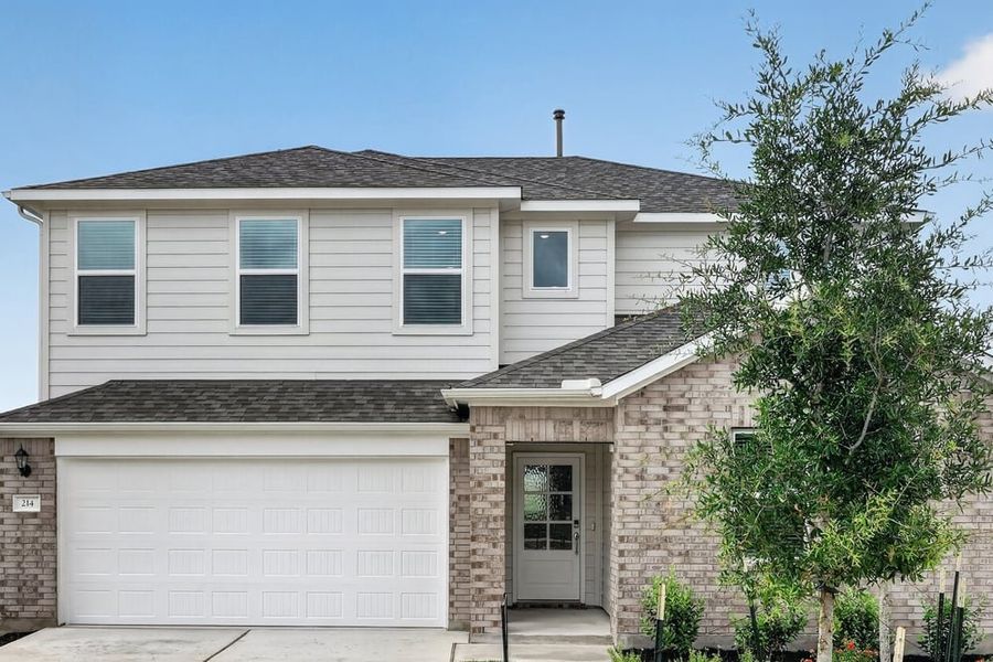 Representative exterior photo of a completed home built from the Warbler by Taylor Morrison in Emory Crossing, Hutto, TX (Image 15).