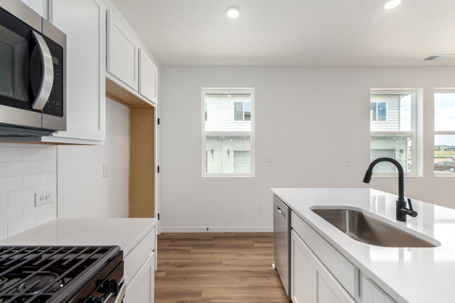 Furnished interior view inside a new home in Painted Prairie, Aurora (Image 8).