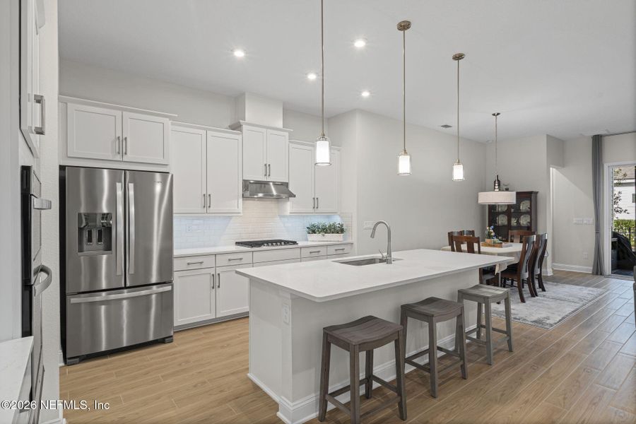 Furnished interior view inside a new home in RiverTown - WaterSong, St. Johns (Image 6).