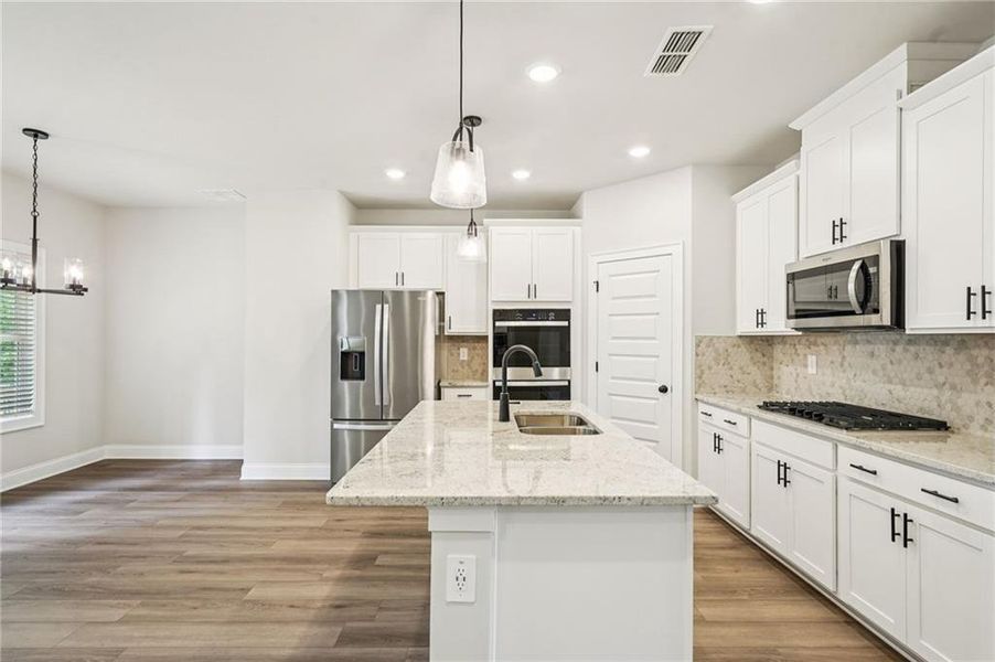 Furnished interior view inside a new home in Martin Springs - Estate Series, Lawrenceville (Image 11).