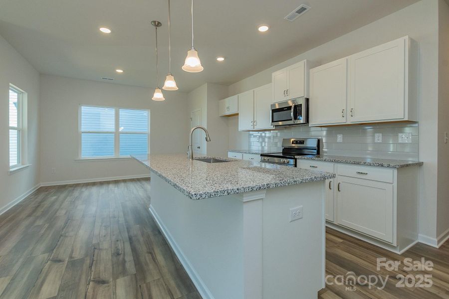 Furnished interior view inside a new home in Country Club Village, Salisbury (Image 11).