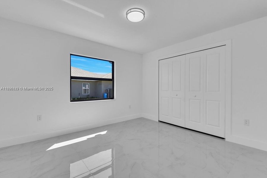 Spacious, unfurnished interior of a new home in , Lehigh Acres (Image 25).