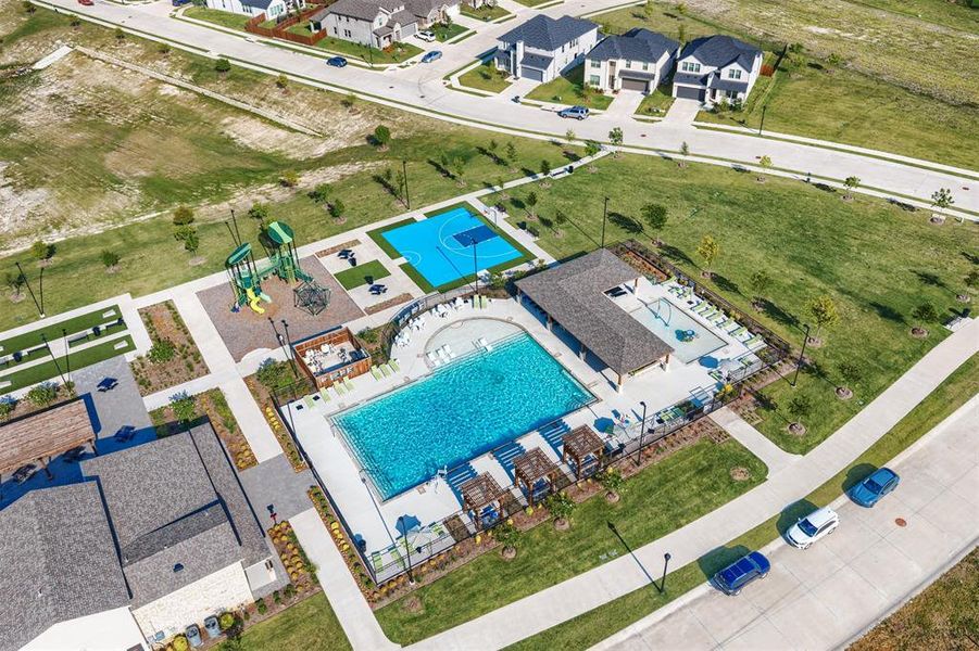Aerial perspective of suburban area with a pool Aerial perspective of suburban area with a pool