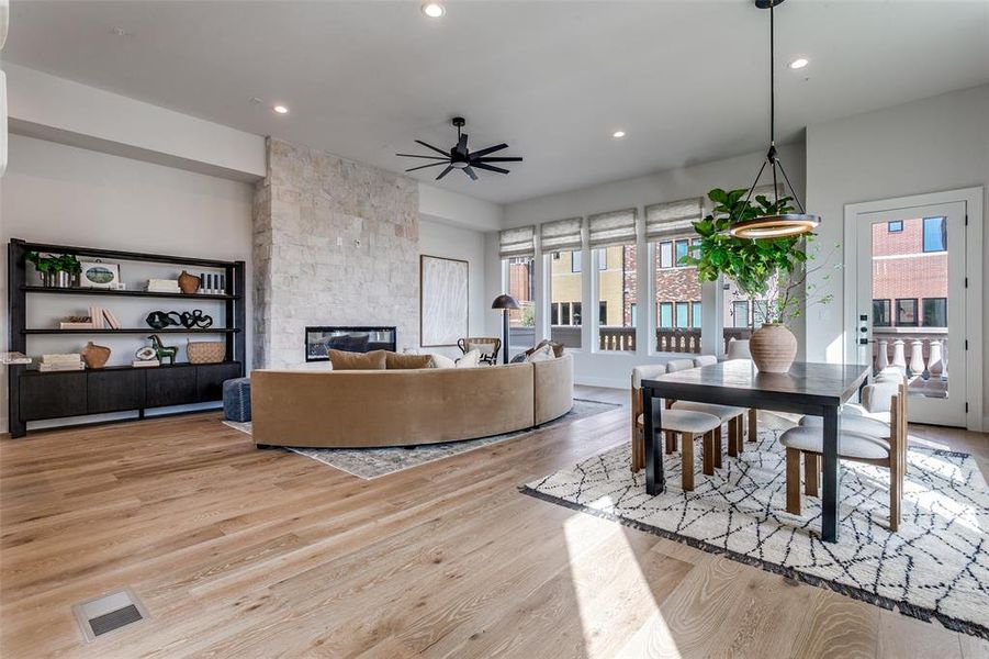 Stylish yet cozy living/dining with 12 foot ceilings and wonderfully large windows!