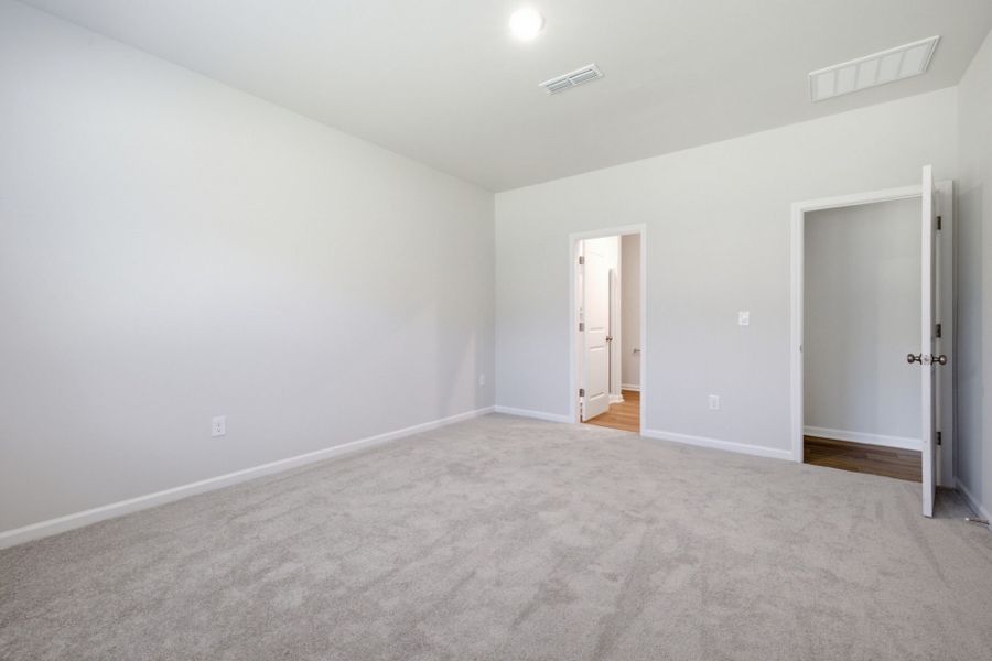 Spacious, unfurnished interior of a new home in Carpenter Falls, Durham (Image 26).